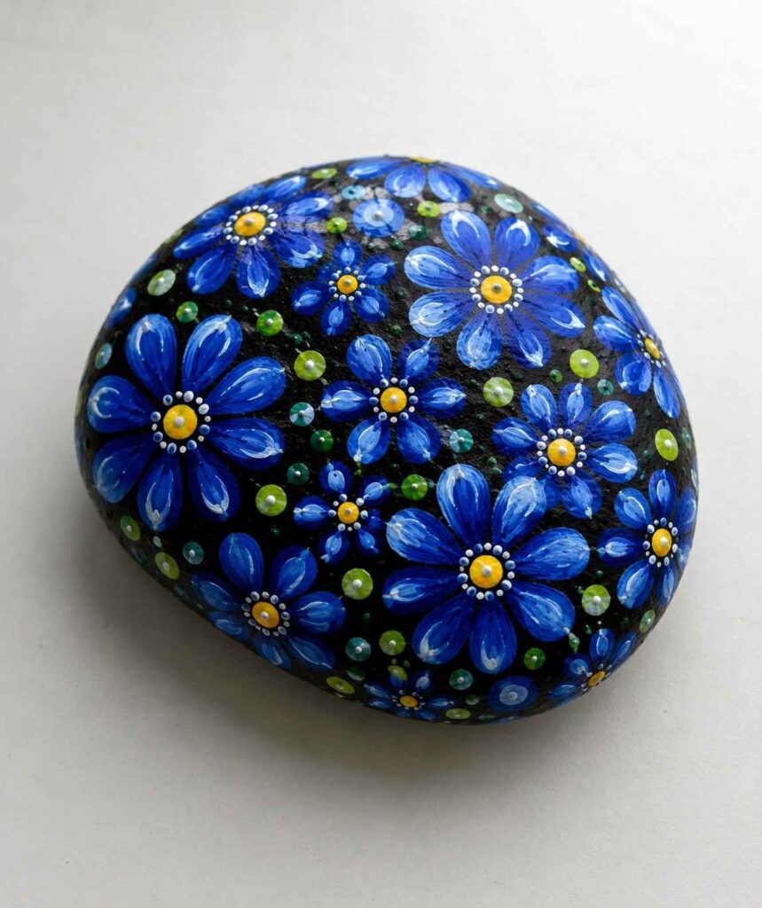 35 Beautiful Painted Rock Ideas to Brighten Your Home and Garden 9 Whimsical Bluebird Blossom Painted Rock