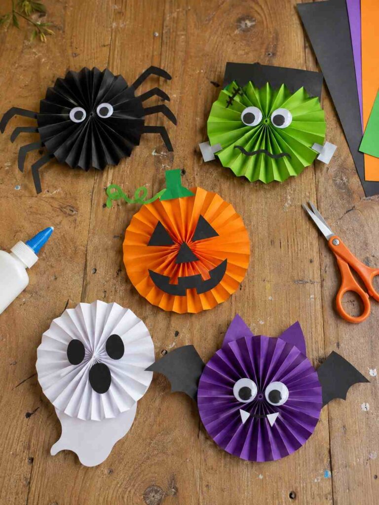 Easy Halloween Crafts to Make Your Home Feel Cozy & Magical 3 DIY Halloween Paper Rosettes