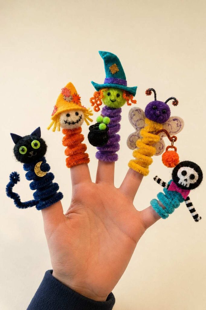 Easy Halloween Crafts to Make Your Home Feel Cozy & Magical 9 Pipe Cleaner Halloween Finger Puppets