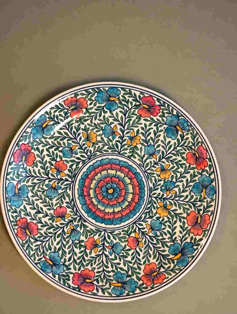 10 Hand-Painted Plate Ideas to Turn Thrift-Store Finds Into Colorful Wall Art 12 Colorful Garden Medallion Plate