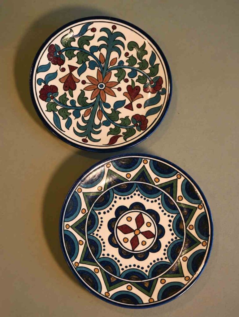 10 Hand-Painted Plate Ideas to Turn Thrift-Store Finds Into Colorful Wall Art 3 Moody Folk-Art Painted Plates