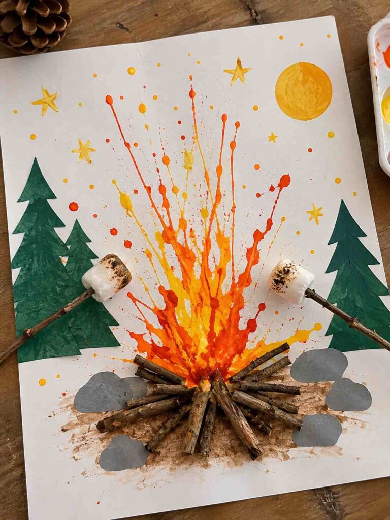 21 Easy & Creative Fall Crafts for Kids to Make at Home 12 10. DIY Paper Campfire Craft for Kids Create a fun little campfire scene using paint and real twigs. Kids can blow paint through a straw to make fiery flames, then add paper trees and tiny sticks for a creative fall camping craft. Materials Needed: - White paper or cardstock - Red, orange, and yellow washable paint - Straw - Small twigs - Green construction paper - Glue How to Make It: 1. Place small drops of orange and yellow paint near the bottom of the paper. 2. Blow gently through a straw to spread the paint upward like flames. 3. Add a few red paint drops for extra color and let the paint dry. 4. Glue small twigs at the bottom to create a campfire. 5. Cut simple green paper trees and glue them on the sides. Quick Tip: Use only a little watered-down paint so it spreads easily. Young children should have adult supervision, and paint should never be sucked into the straw.