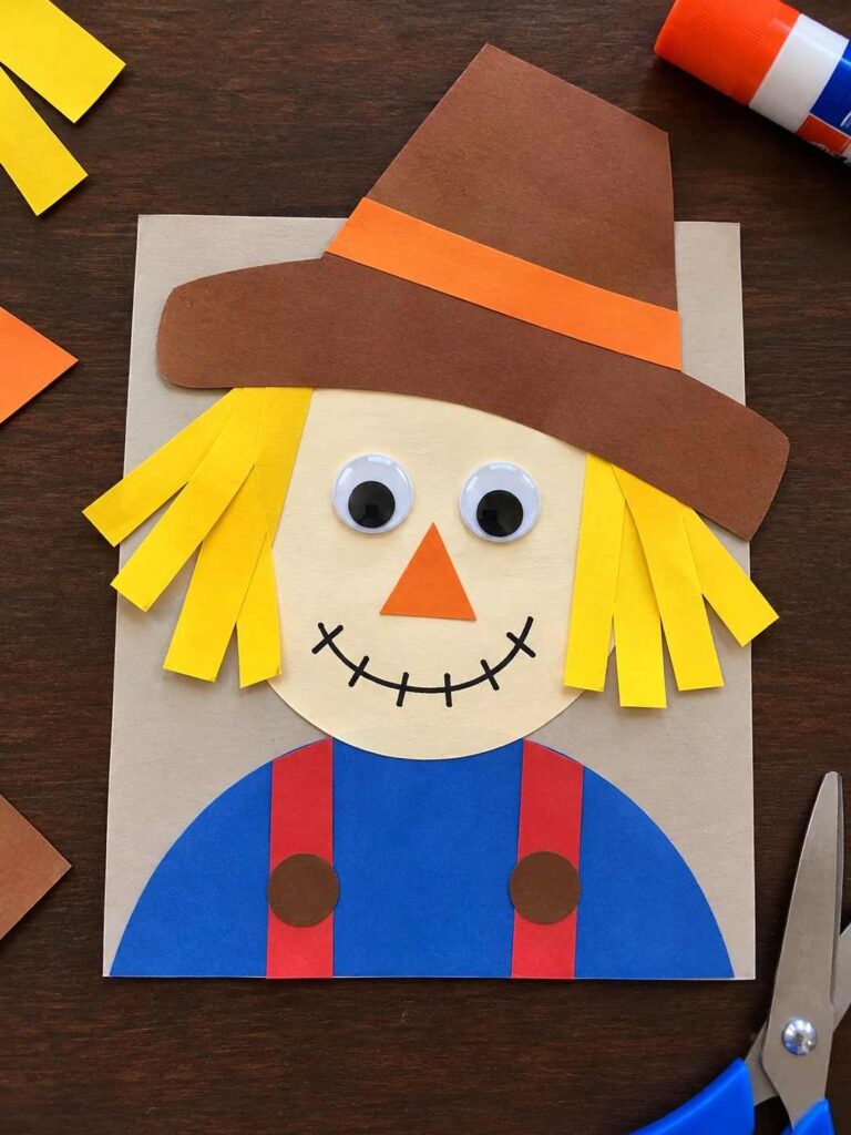21 Easy & Creative Fall Crafts for Kids to Make at Home 7 DIY Paper Scarecrow Craft-